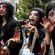 Young women wear traditional Japanese garb and zombie makeup.